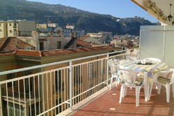 The large terrace equipped with chairs and table