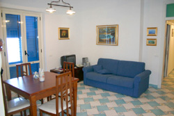 The living-room with sofa-bed of  Marina Grande apartment