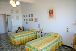 The twin beds of Chiara apartment